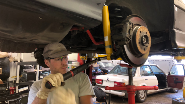 Ethan torquing those Bilsteins to spec.